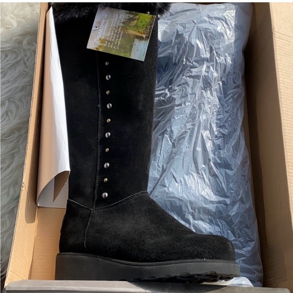 Only worn once. Brand new bear paw Dorothy boots.
